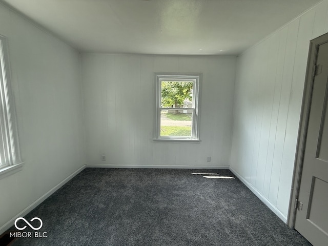 1914 E 23rd St, Muncie, IN 47302 - unfurnished room with dark carpet