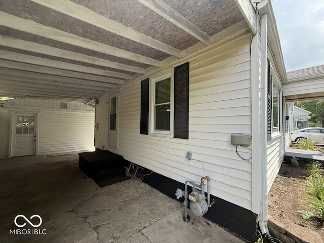 1914 E 23rd St, Muncie, IN 47302 - view of side of property with a carport