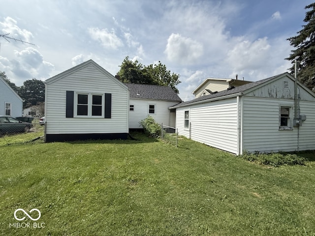1914 E 23rd St, Muncie, IN 47302 - back of house with roof with shingles