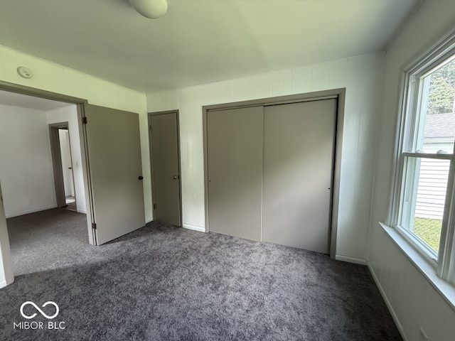 1914 E 23rd St, Muncie, IN 47302 - unfurnished bedroom featuring carpet and a closet