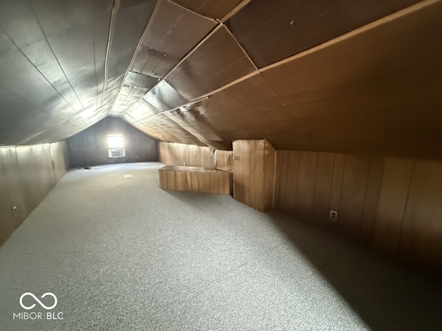 1914 E 23rd St, Muncie, IN 47302 - bonus room with lofted ceiling, carpet flooring, and wood walls