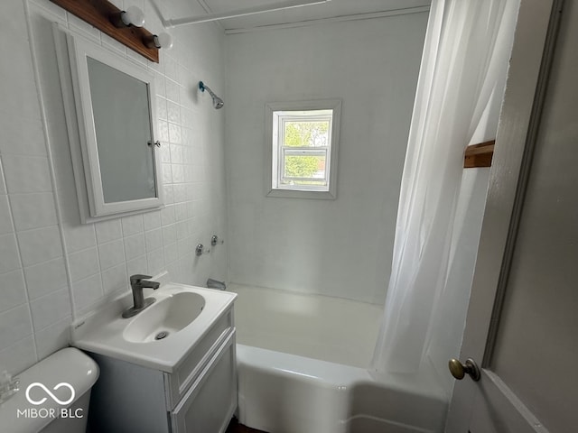 1914 E 23rd St, Muncie, IN 47302 - full bathroom featuring vanity, tile walls, shower / tub combo with curtain, and decorative backsplash