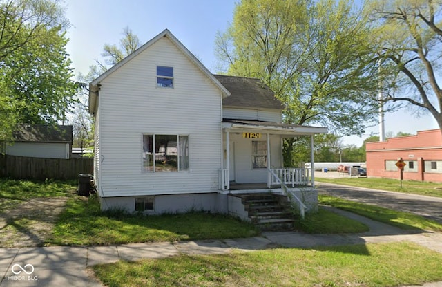 1129 Lafayette St, Elkhart, IN 46516 - view of front of home featuring covered porch and driveway