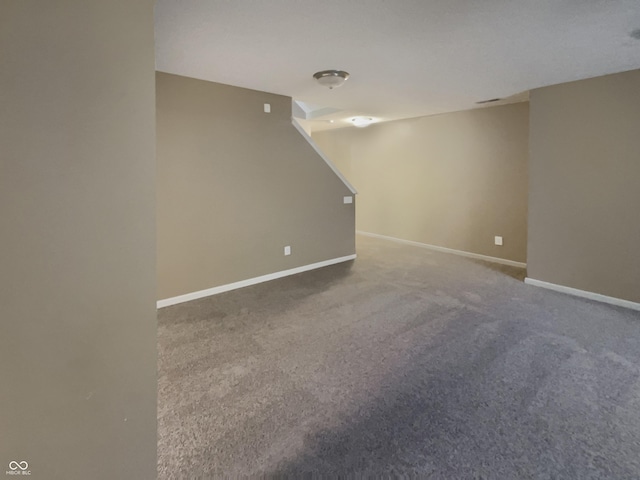 12089 Red Hawk Dr, Fishers, IN 46037 - finished below grade area featuring baseboards and carpet floors