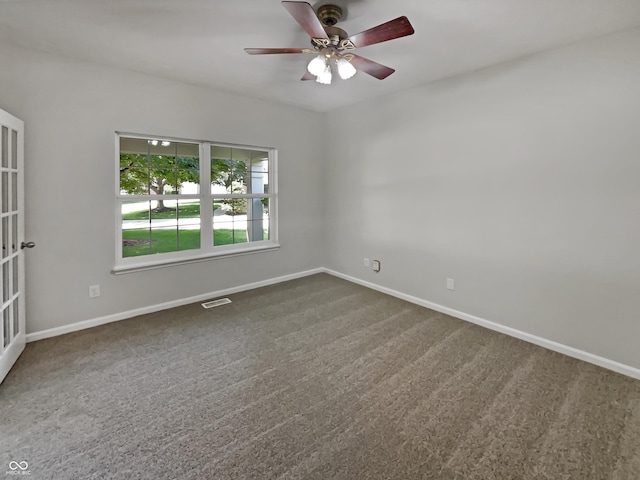 12089 Red Hawk Dr, Fishers, IN 46037 - empty room featuring ceiling fan and dark carpet