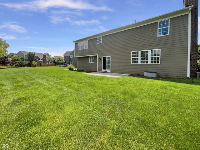 12089 Red Hawk Dr, Fishers, IN 46037 - back of property featuring a patio and a yard