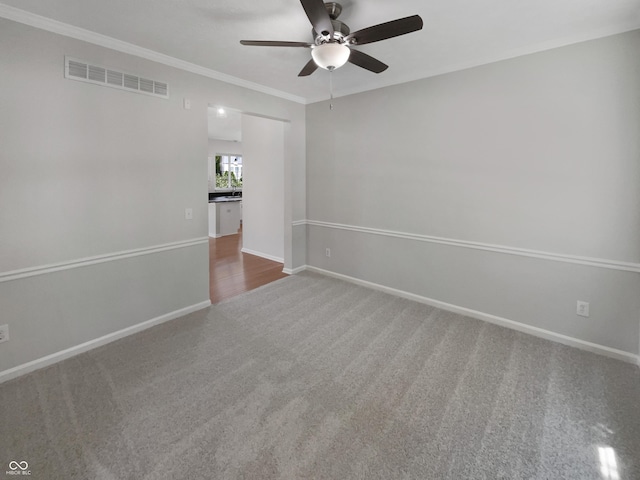 12089 Red Hawk Dr, Fishers, IN 46037 - carpeted empty room with ceiling fan and crown molding