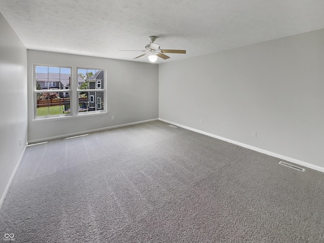 12089 Red Hawk Dr, Fishers, IN 46037 - empty room with ceiling fan, carpet floors, and a textured ceiling