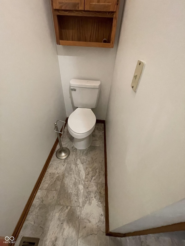 10610 Stillcreek Dr, Indianapolis, IN 46239 - bathroom featuring baseboards and marble finish floors