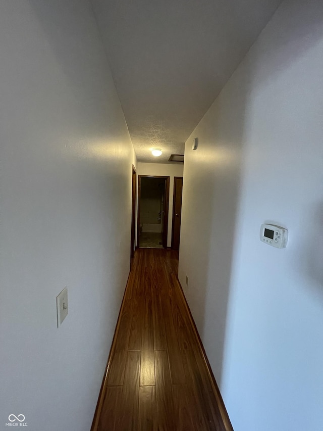 10610 Stillcreek Dr, Indianapolis, IN 46239 - hallway featuring wood finished floors