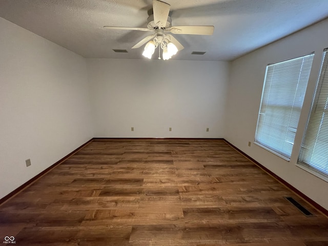 10610 Stillcreek Dr, Indianapolis, IN 46239 - empty room featuring wood finished floors and ceiling fan