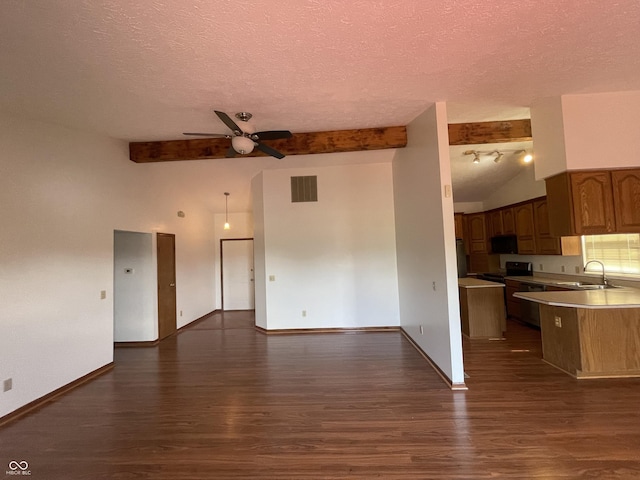 10610 Stillcreek Dr, Indianapolis, IN 46239 - unfurnished living room featuring ceiling fan, a textured ceiling, beamed ceiling, dark wood-type flooring, and high vaulted ceiling