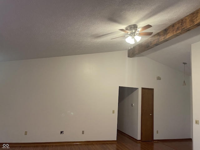 10610 Stillcreek Dr, Indianapolis, IN 46239 - spare room featuring a ceiling fan, dark wood-type flooring, and a textured ceiling