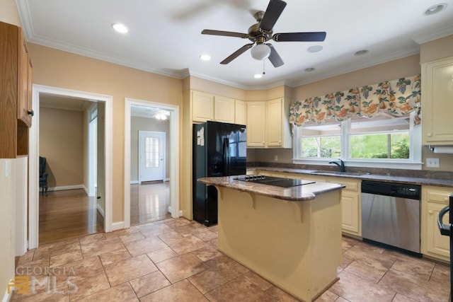 kitchen with light tile floors, ceiling fan, a kitchen breakfast bar, and black appliances