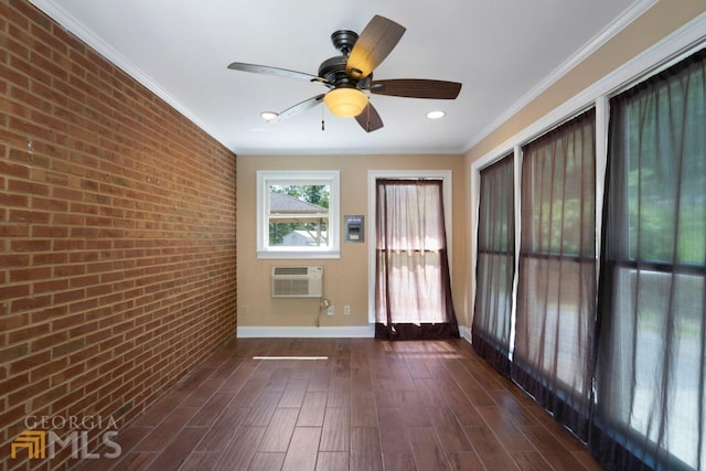 unfurnished room featuring ceiling fan, brick wall, ornamental molding, and a wall mounted AC