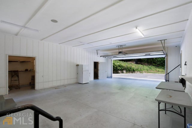 garage featuring white refrigerator