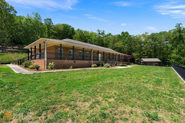 view of front facade with a porch and a front lawn