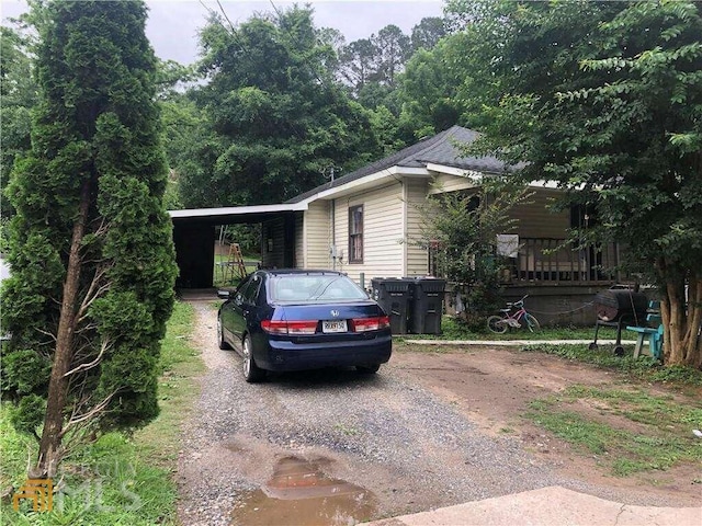 view of front of home with a carport