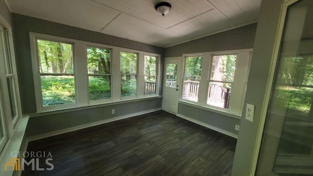 unfurnished sunroom with lofted ceiling and a wealth of natural light