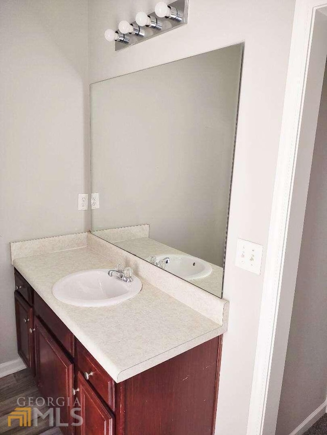 1208 Bordeau Way, Villa Rica, GA 30180 - bathroom with hardwood / wood-style floors and large vanity