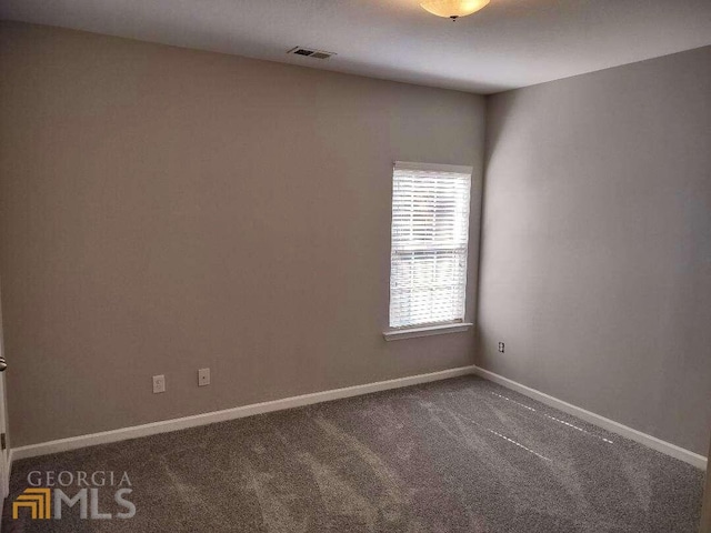1208 Bordeau Way, Villa Rica, GA 30180 - unfurnished room with dark carpet