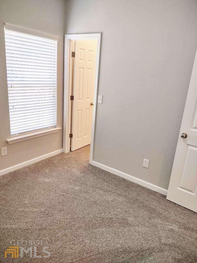 1208 Bordeau Way, Villa Rica, GA 30180 - empty room featuring dark colored carpet