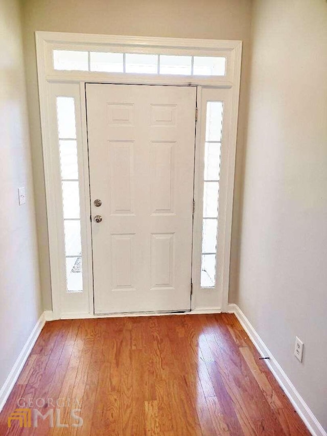 1208 Bordeau Way, Villa Rica, GA 30180 - entryway featuring light wood-type flooring