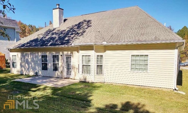 1208 Bordeau Way, Villa Rica, GA 30180 - rear view of house with a patio and a yard