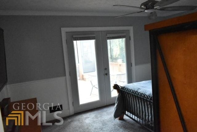 carpeted bedroom featuring ceiling fan, access to outside, and french doors