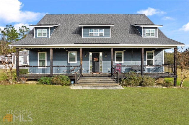 farmhouse featuring a front lawn and covered porch