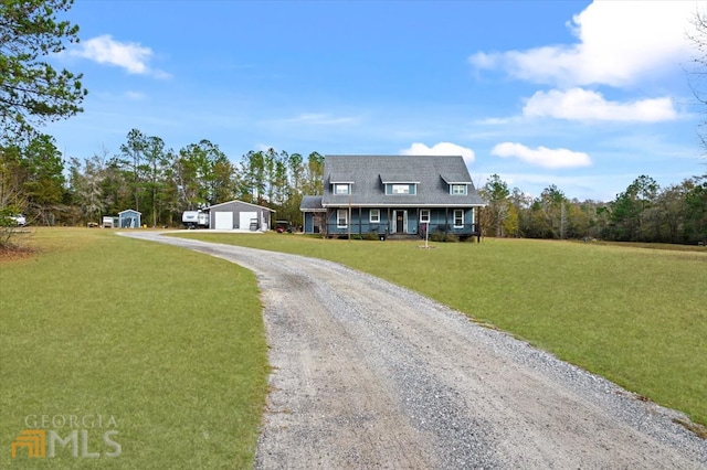 cape cod house with a front lawn