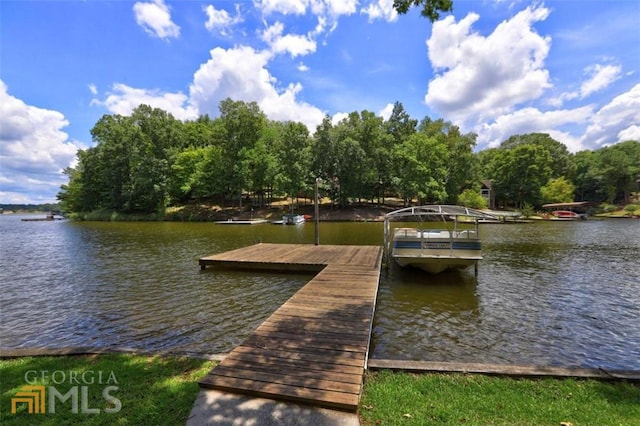 view of dock with a water view