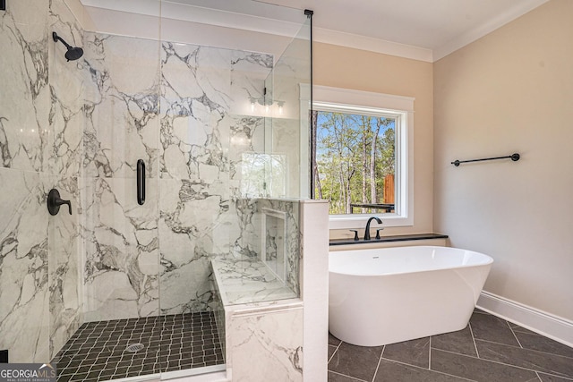 101 Bonnie Lynn Ln, Carrollton, GA 30117 - bathroom featuring a marble finish shower, baseboards, a freestanding bath, and crown molding