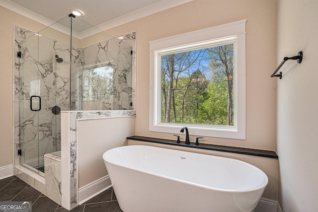 101 Bonnie Lynn Ln, Carrollton, GA 30117 - full bathroom featuring a freestanding bath, crown molding, a marble finish shower, and baseboards