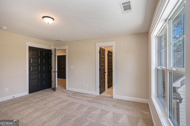 101 Bonnie Lynn Ln, Carrollton, GA 30117 - spare room with visible vents, baseboards, and carpet floors