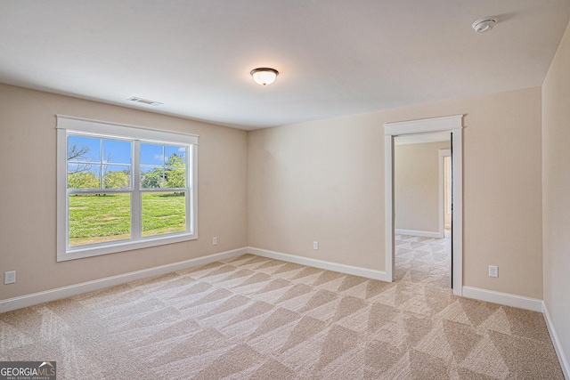 101 Bonnie Lynn Ln, Carrollton, GA 30117 - unfurnished room with light carpet, baseboards, and visible vents