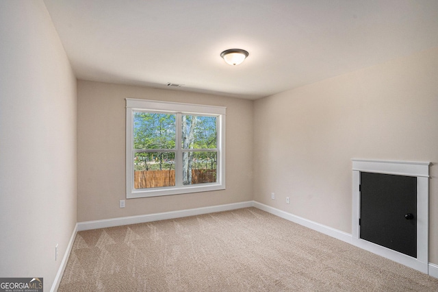 101 Bonnie Lynn Ln, Carrollton, GA 30117 - carpeted empty room featuring baseboards