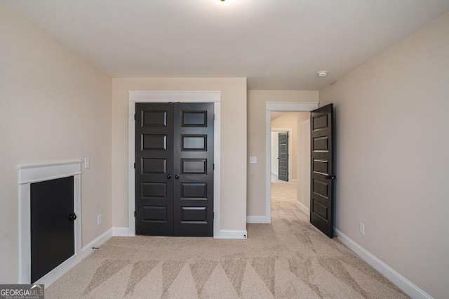101 Bonnie Lynn Ln, Carrollton, GA 30117 - foyer entrance featuring carpet and baseboards