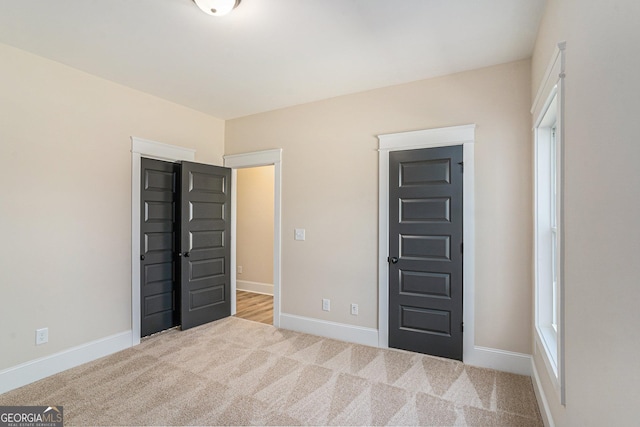 101 Bonnie Lynn Ln, Carrollton, GA 30117 - unfurnished bedroom featuring baseboards and carpet floors