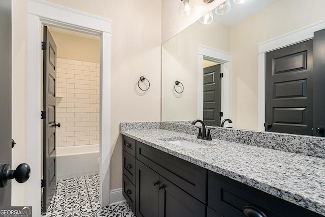 101 Bonnie Lynn Ln, Carrollton, GA 30117 - full bathroom with shower / tub combination, vanity, baseboards, and tile patterned flooring