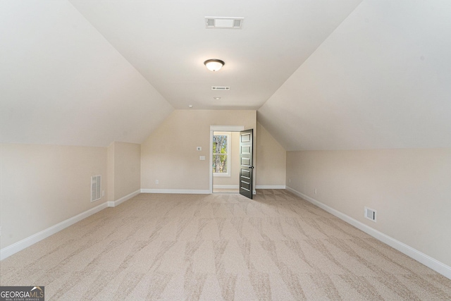 101 Bonnie Lynn Ln, Carrollton, GA 30117 - bonus room with baseboards, vaulted ceiling, and visible vents