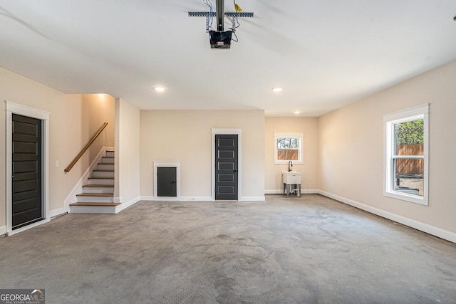 101 Bonnie Lynn Ln, Carrollton, GA 30117 - interior space with a sink, baseboards, recessed lighting, and a garage door opener