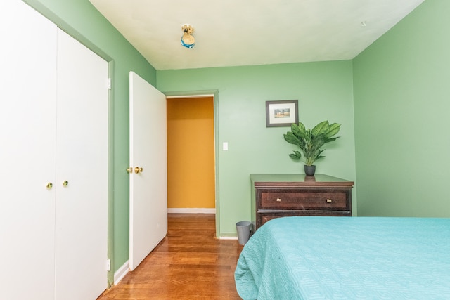 bedroom with light wood-type flooring