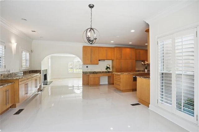 kitchen with light tile flooring, a kitchen island, stone counters, decorative light fixtures, and crown molding