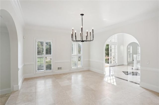 unfurnished dining area with crown molding, light tile floors, and a chandelier