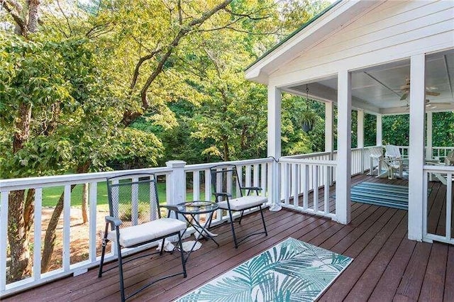 wooden deck with ceiling fan