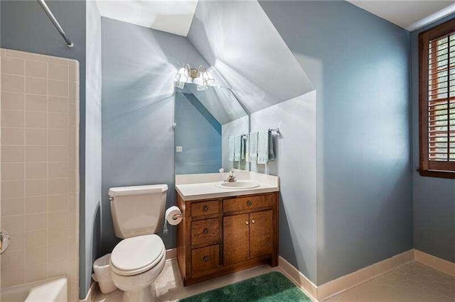 full bathroom featuring tile flooring, vanity with extensive cabinet space, toilet, and tiled shower / bath combo