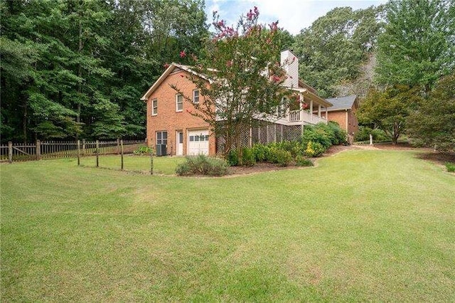 view of yard with a garage