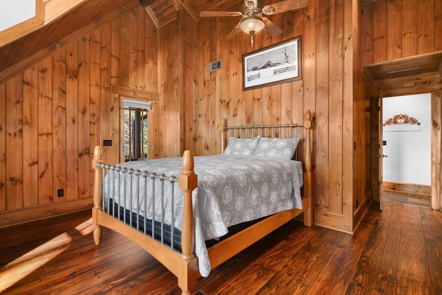 686 Lake Dr, Morganton, GA 30560 - bedroom featuring ceiling fan, lofted ceiling with beams, wood walls, and dark hardwood / wood-style floors