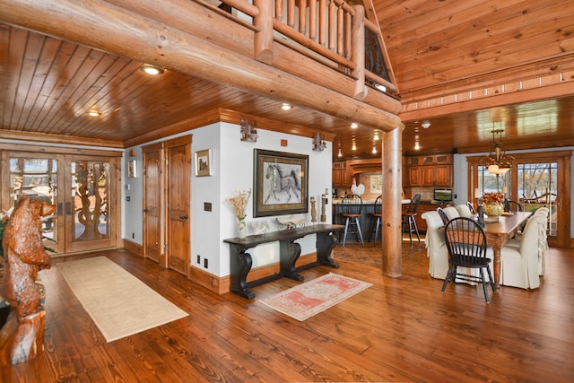 686 Lake Dr, Morganton, GA 30560 - living room with french doors, wooden ceiling, an inviting chandelier, and dark hardwood / wood-style flooring